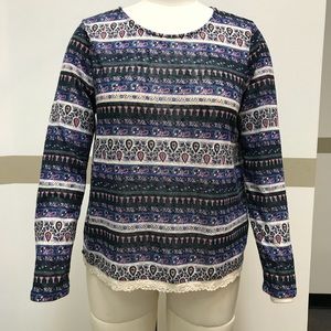 Blue printed long sleeve top.